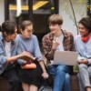 Students sitting on bench enjoying time management program