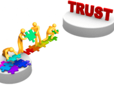 Graphic of figures placing puzzle pieces together towards trust