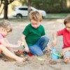children play outdoors building a relationship