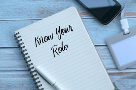 know your role written on pad of paper